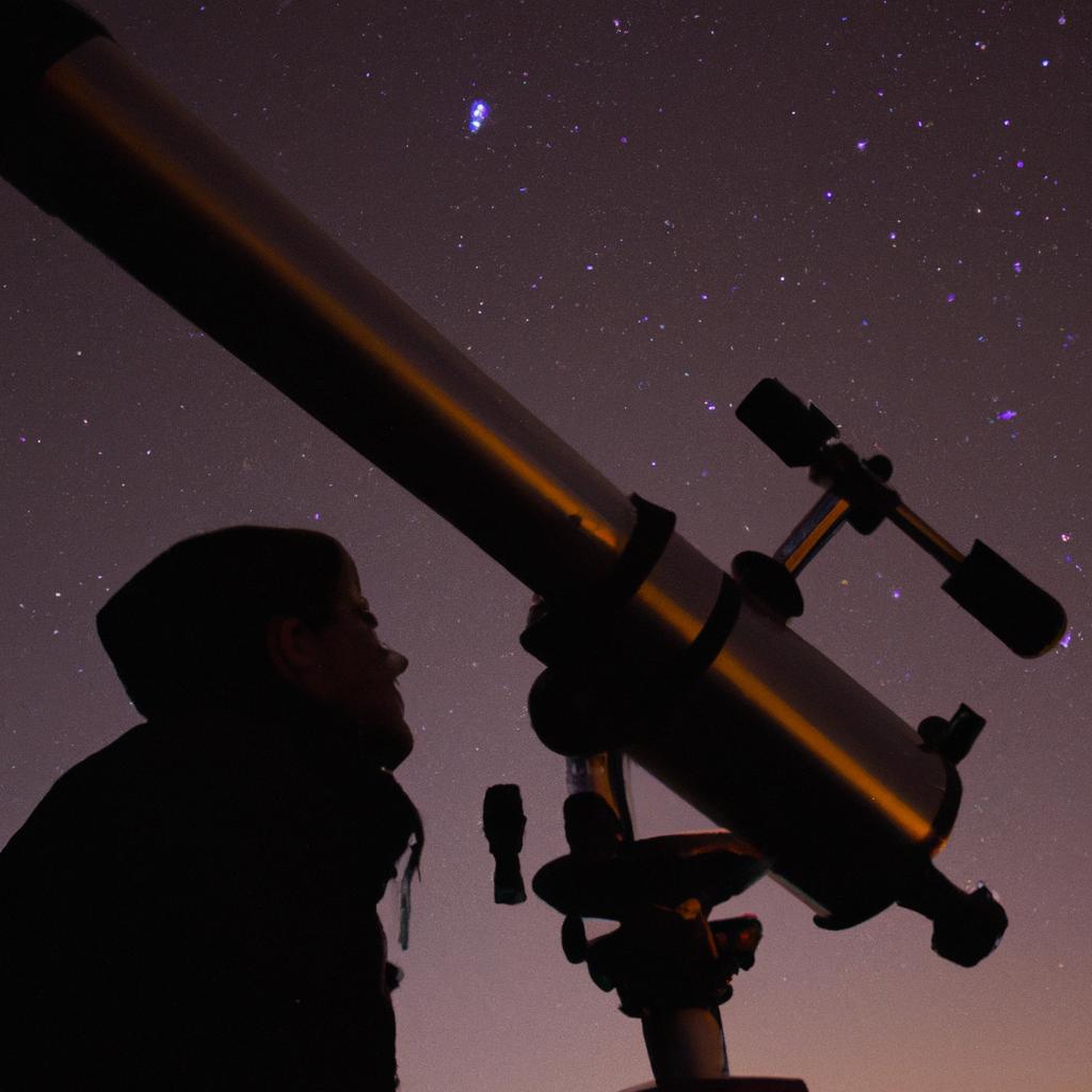 Person observing stars through telescope